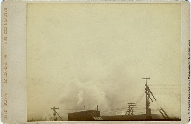 Baldwin Coolidge, industrial rooftop study, before 1891 — rooftops, telegraph wires and smokestacks against a cloudy Boston sky